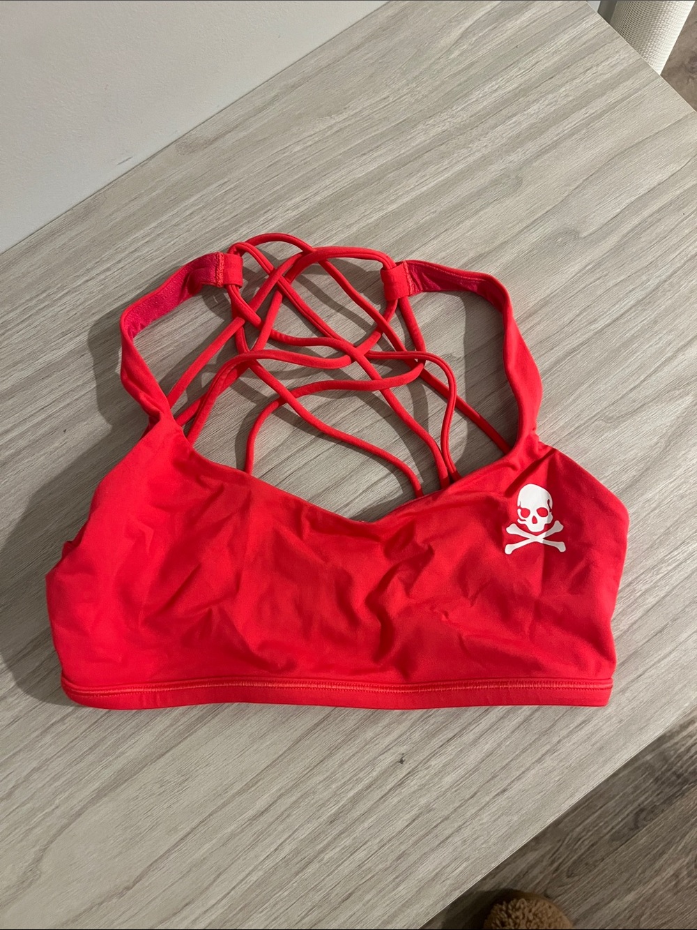 lululemon athletica coral Strappy Sports Bra with Skull Logo soulcycle size 6